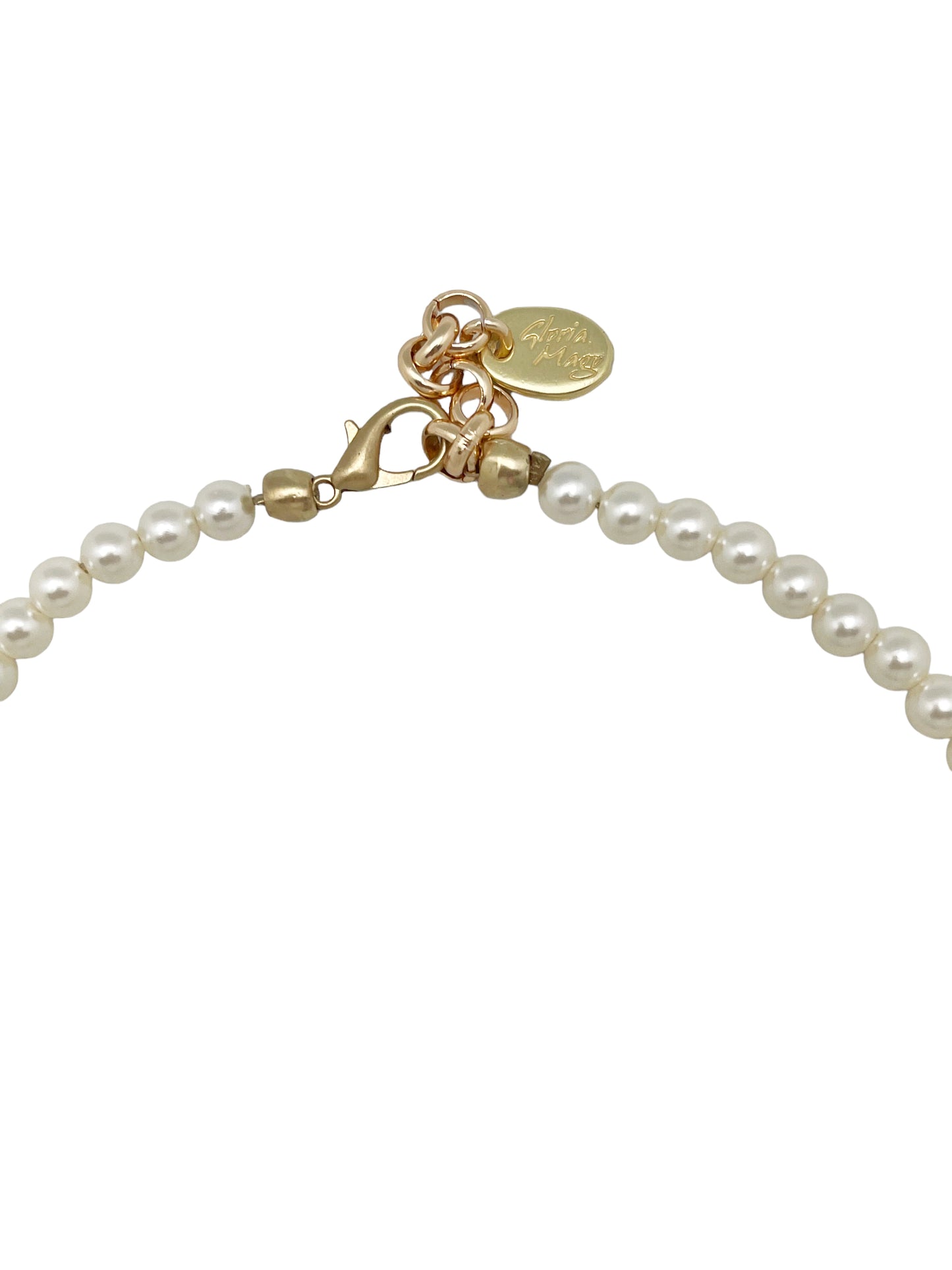 Colar de pérolas e moedas douradas