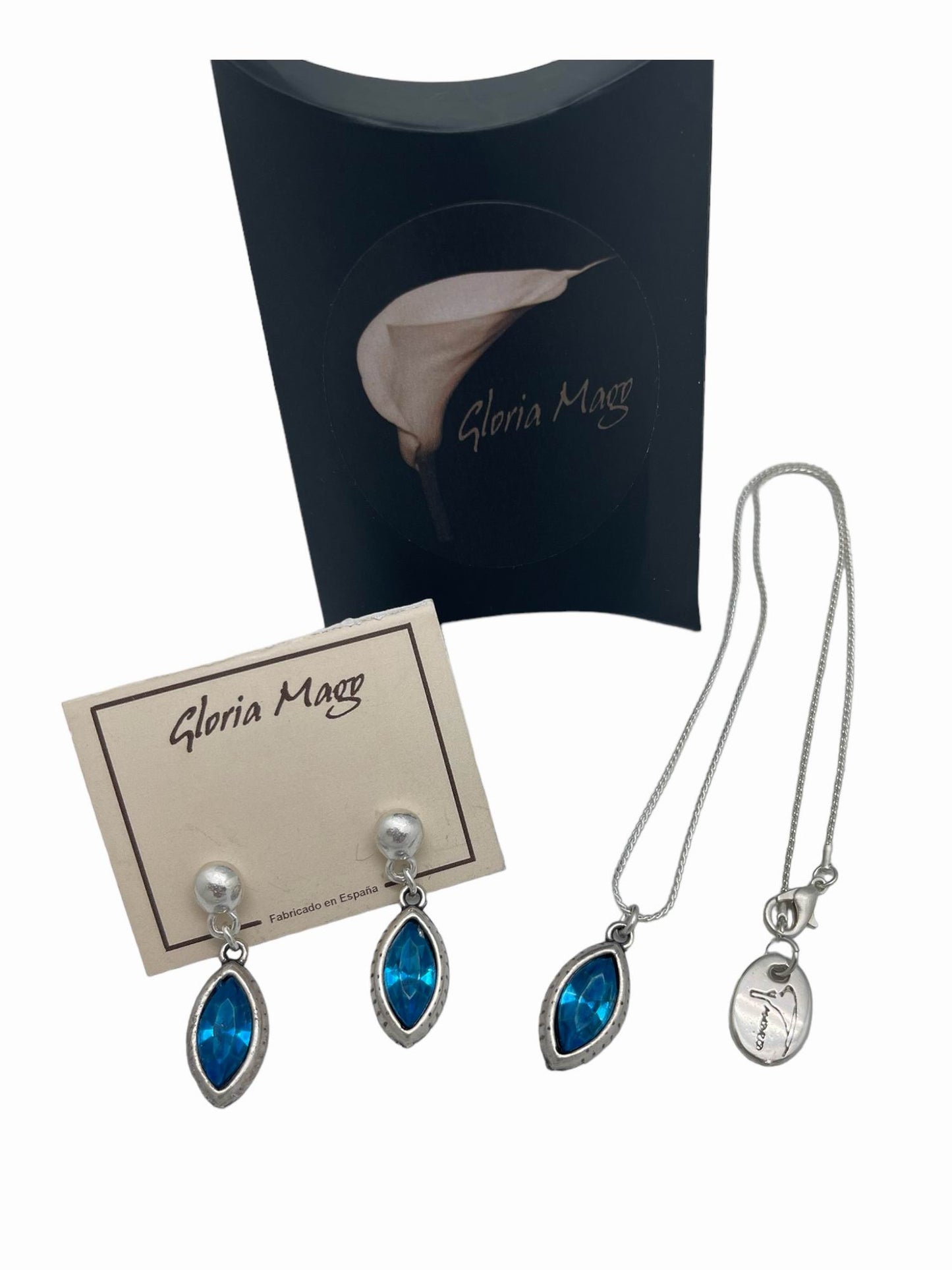 Conjunto colgante y pendientes de lagríma en zamak chapado plata de ley y cristal facetado en azul .