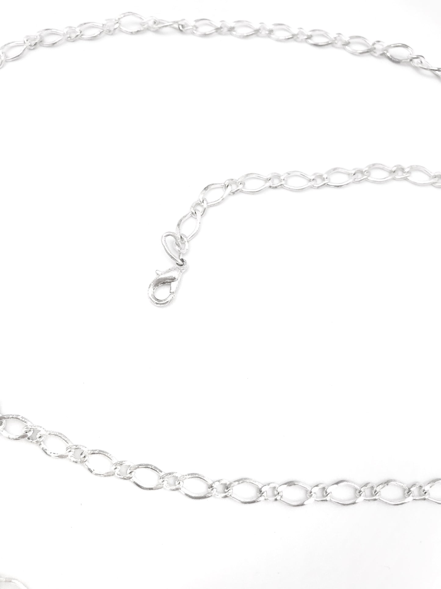 Cinturón cadena en plata con colgantes de rosa