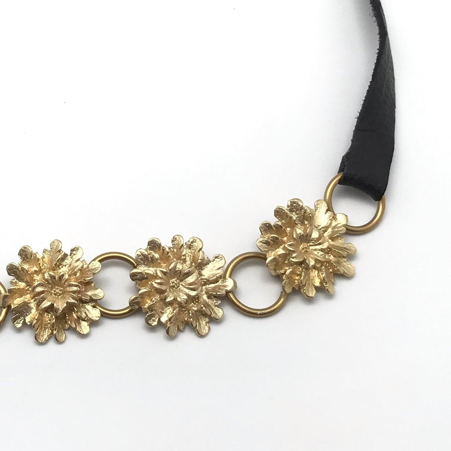 Rosette leather and gold metal belt. size 110