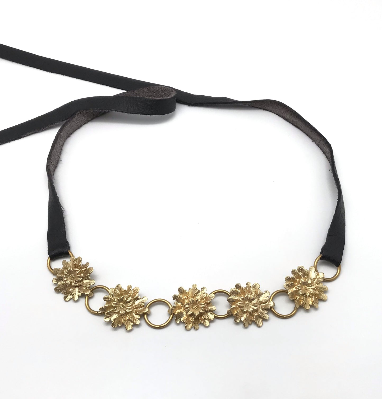 Rosette leather and gold metal belt. size 110