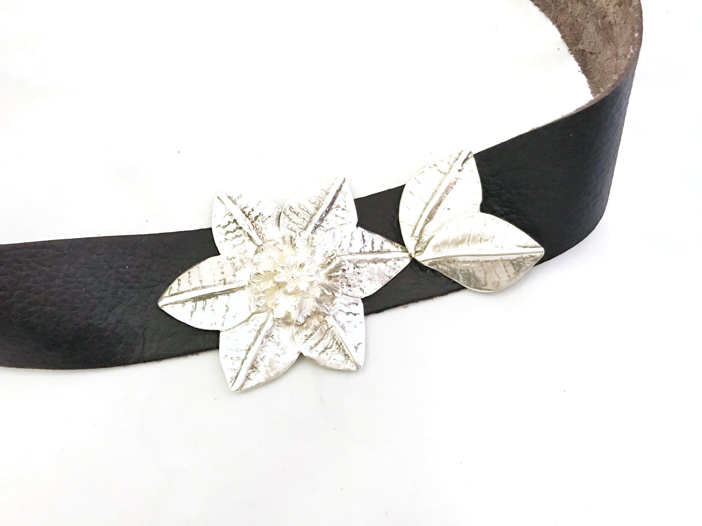 Wide black-plated silver and leather belt