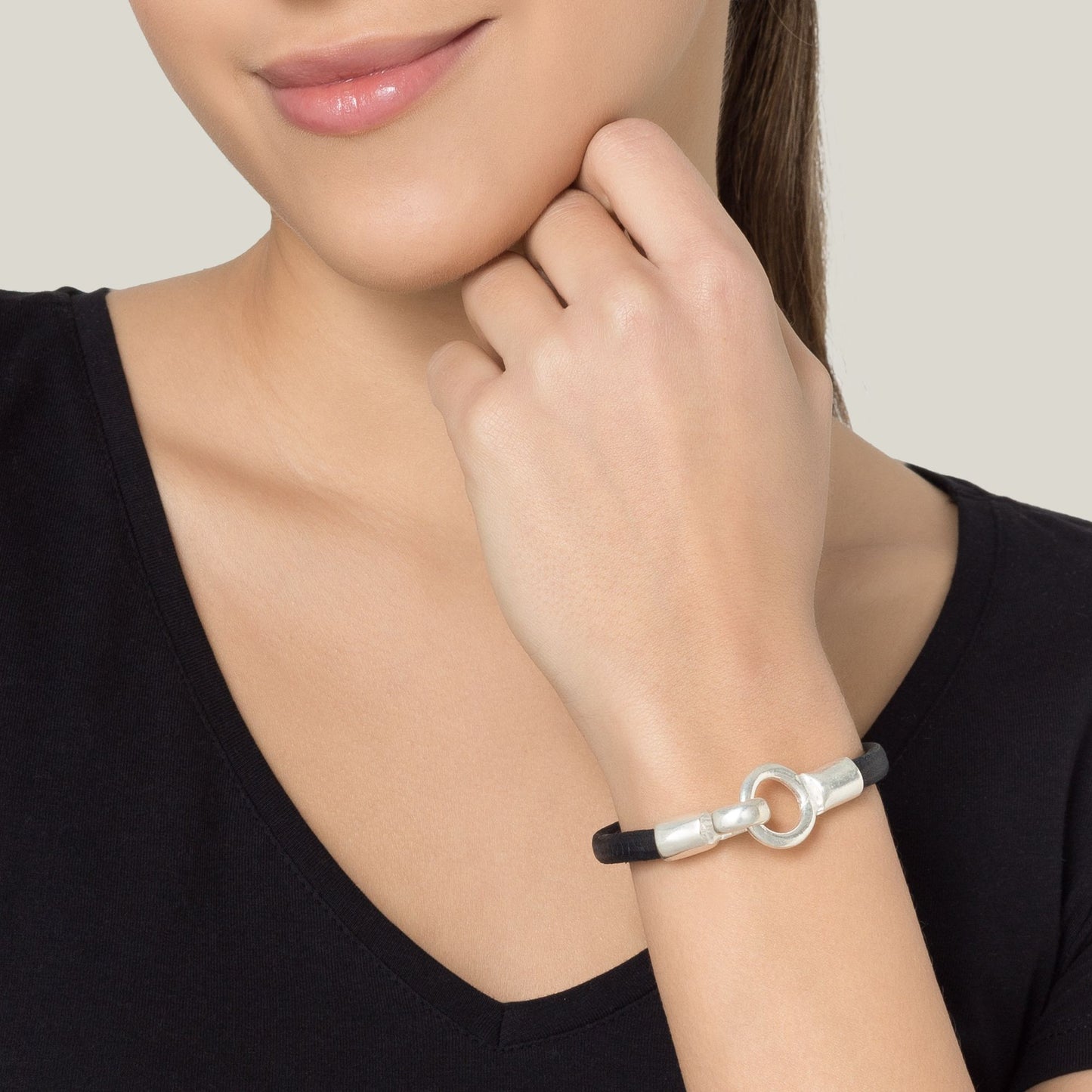 Black leather bracelet and silver plated hook closure