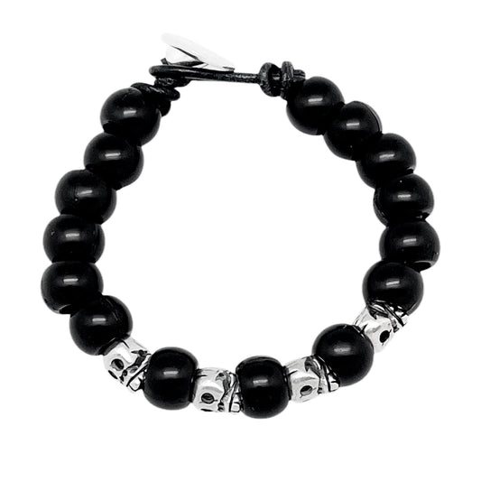 Pulsera Skull negra y cuero plata chapado