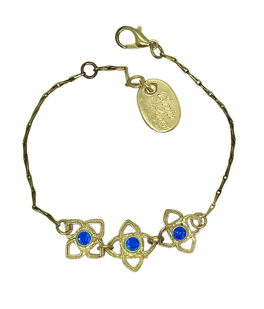 Pulsera Mismy dorado Tres flores y cristal SW color azul