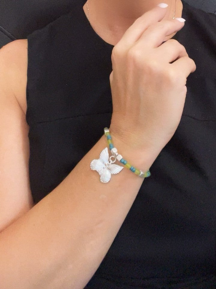 Pulsera mariposa elastica en plata y verdes cristal o dorado y rosas